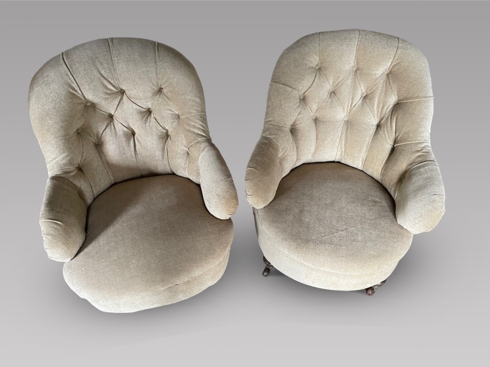 A Pair of Low Button Back Chairs