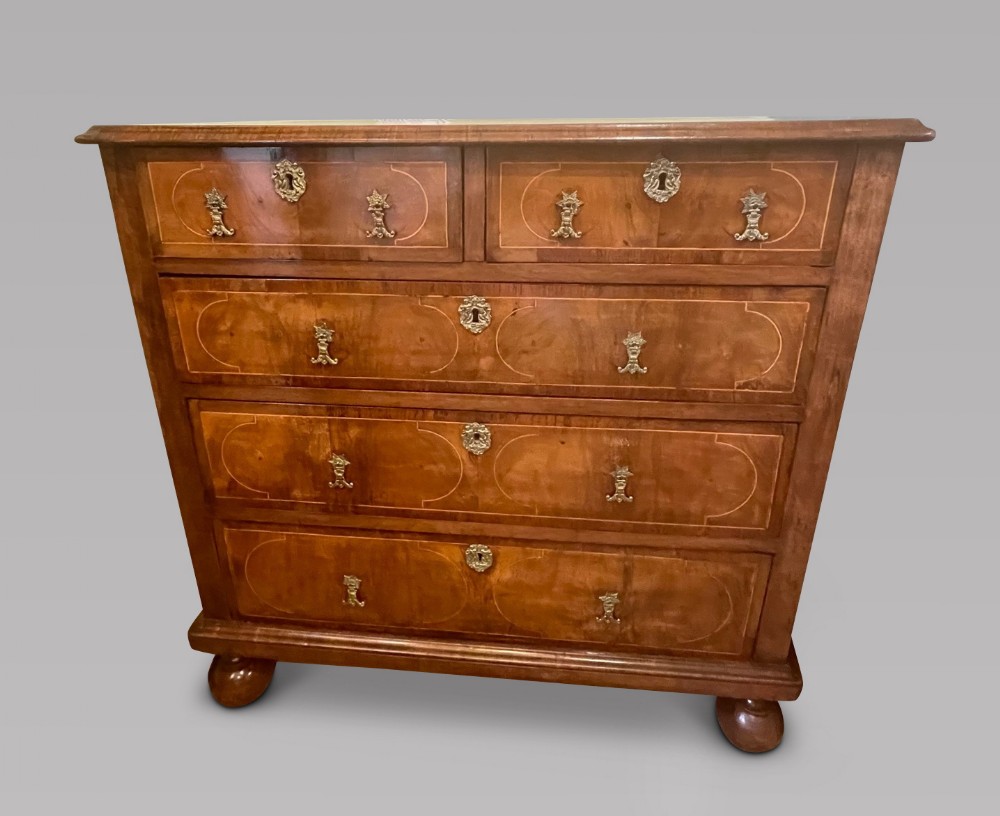 A Late 17th Century Walnut and Tracery Strung Chest of Drawers