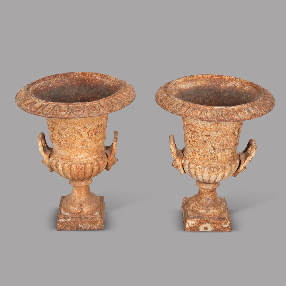 A Pair of Cast Iron Urns View II