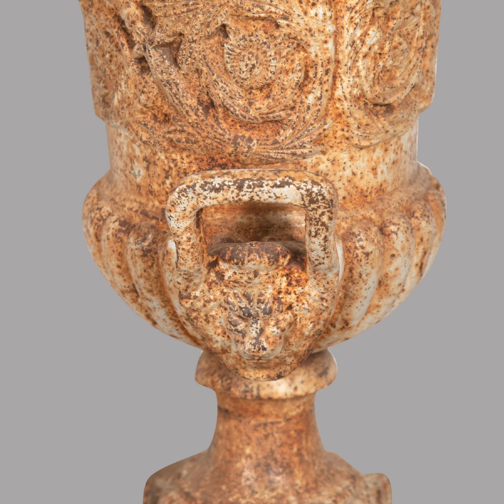 A Pair of Cast Iron Urns View III