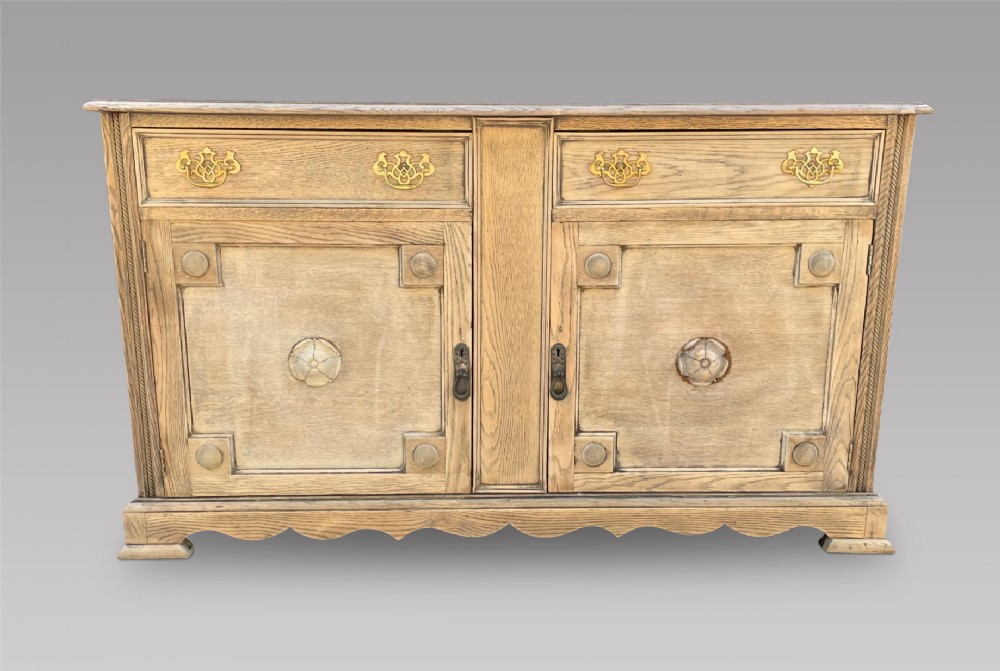 An Arts and Crafts Stripped Oak Dresser Base