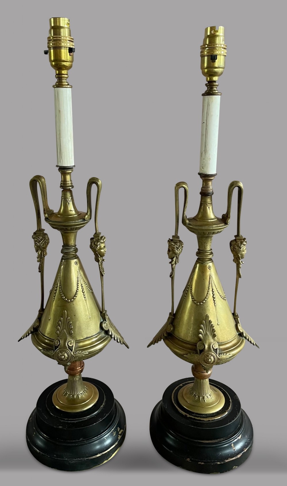 A Pair of French Decorative Brass Lamps