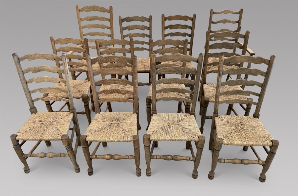 A Harlequin Set Of Twelve Ladder Back Armchairs