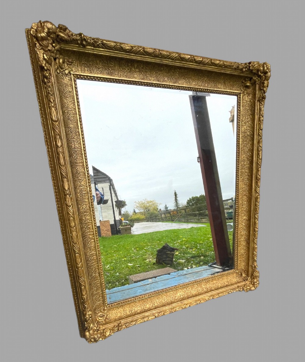 19th Century Large Giltwood Floral Motif Wall Mirror
