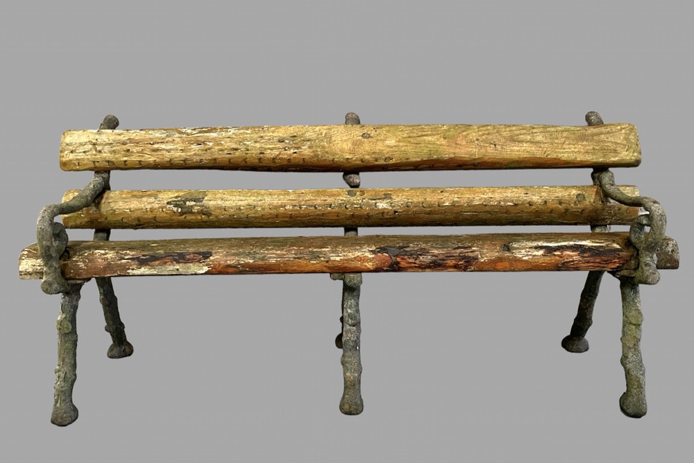 An Iron and Wooden Log Garden Seat