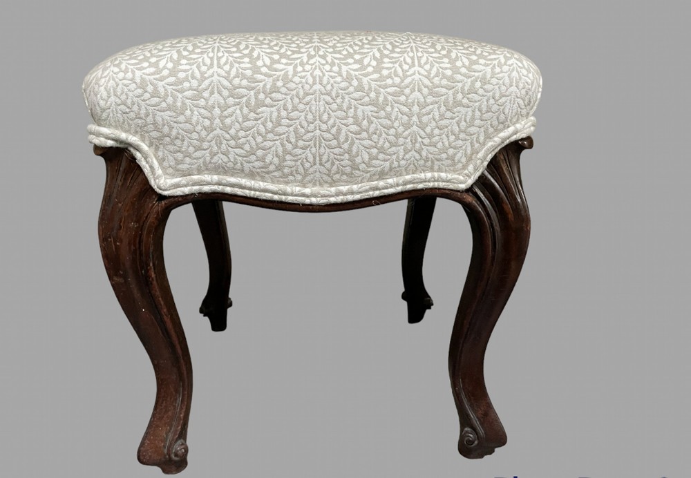 A Walnut Stool