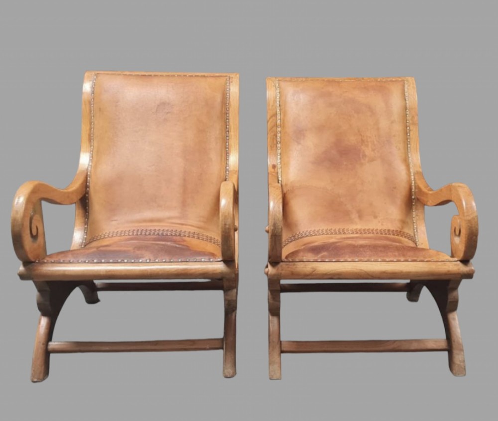 A Pair of c1930 Tan Plantation Leathered Armchairs