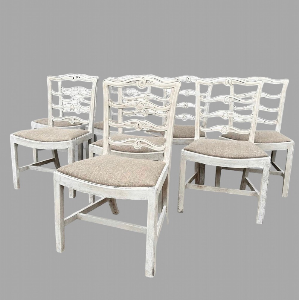 A Set of Eight Ribbon Back Painted Dining Chairs