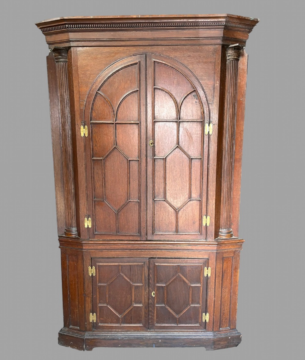 A Large Georgian Oak Corner Cupboard