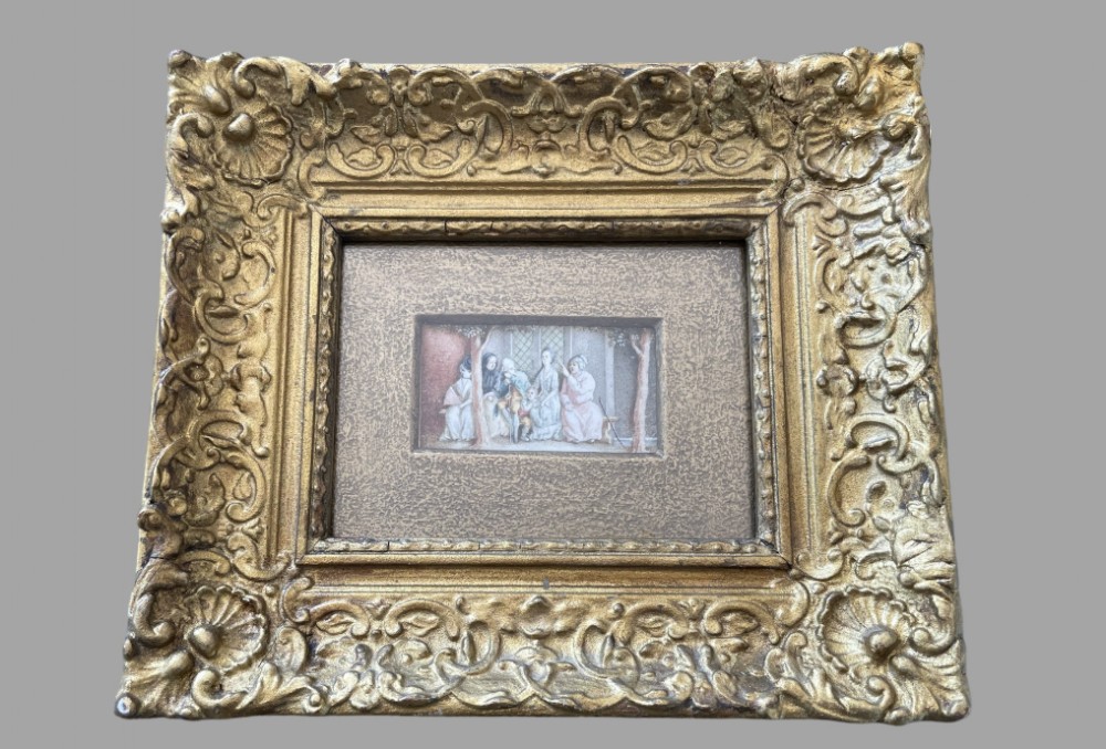 A 18th century genre watercolour of a seated family