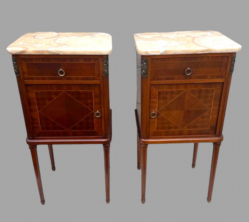 A Pair of French Inlaid Mahogany Bedside Tables