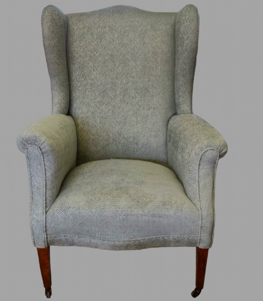 A c1910 Beech Wing Armchair