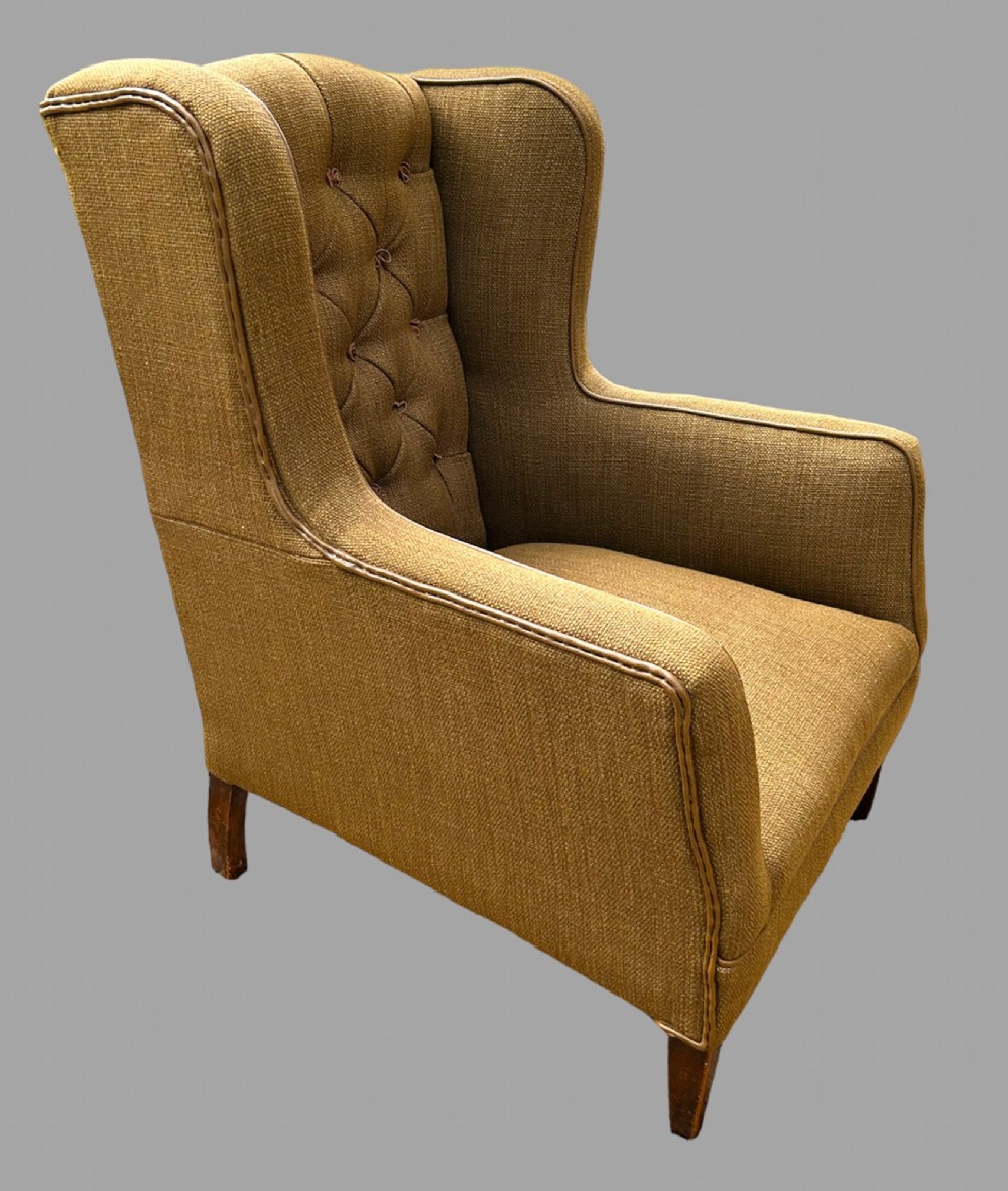 An Edwardian Period Button Back Armchair