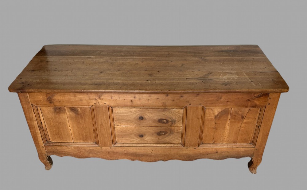 A Large Fruitwood Panelled Chest