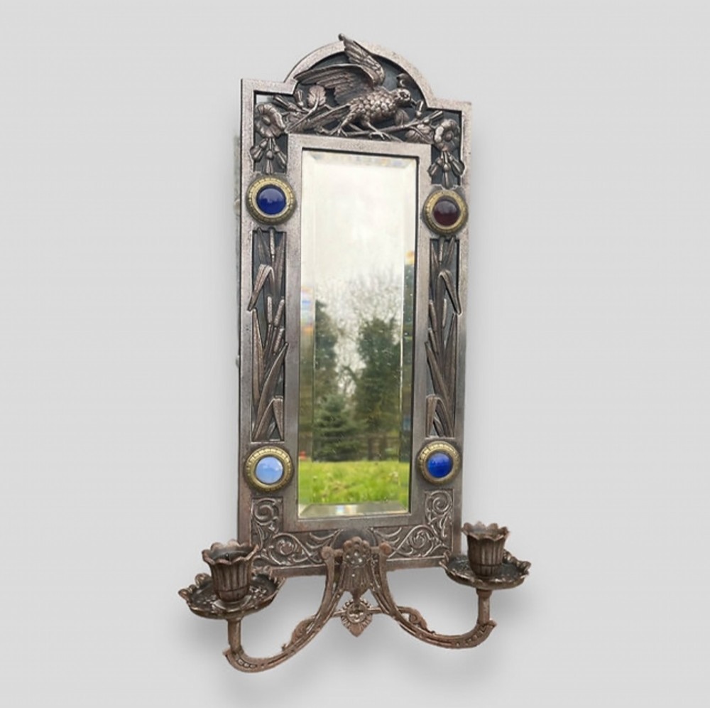 An Aesthetic Movement Pewter Wall Sconce