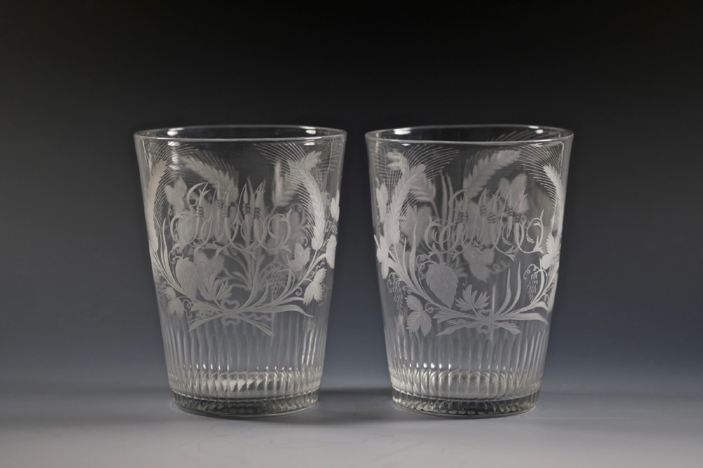 Fine pair of large engraved tumblers with basal cut flutes English C1790
