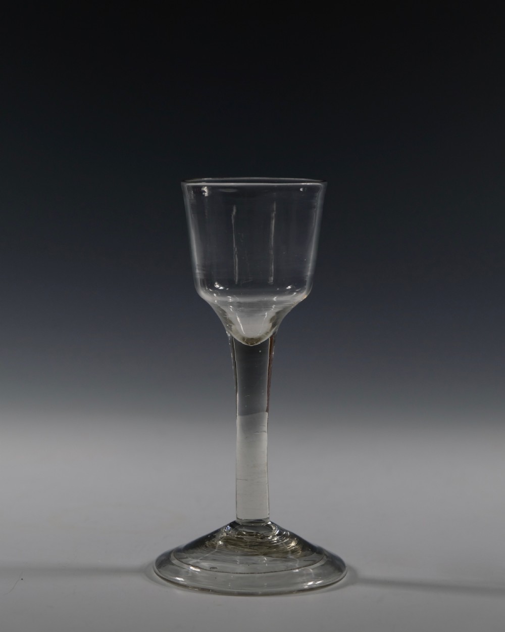 Plain stem wine glass with folded foot English C1760