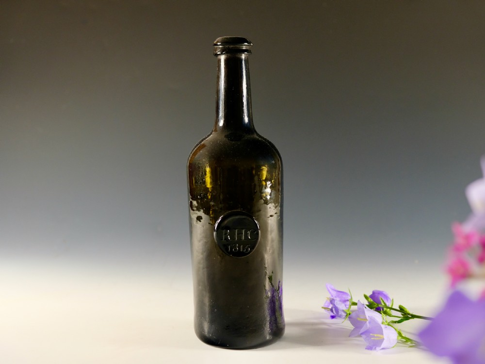 Antique glass - sealed wine bottle RHC 1815