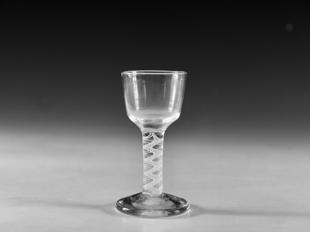 Antique glass opaque twist dram glass English c1765