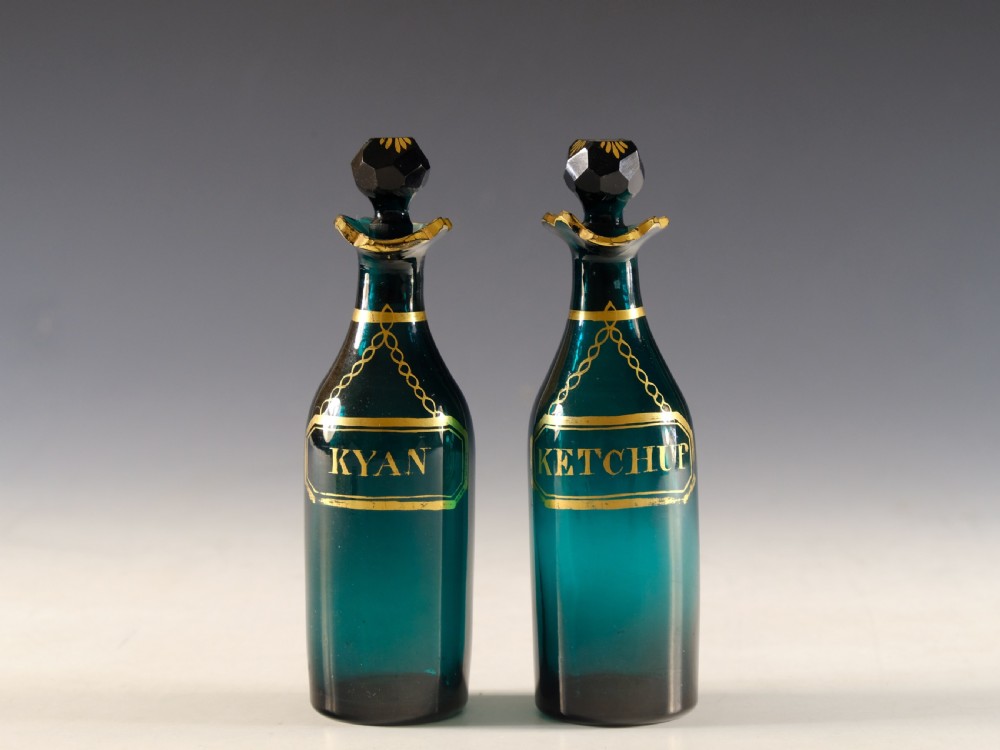 Antique glass - pair of green cruet bottles English c1800