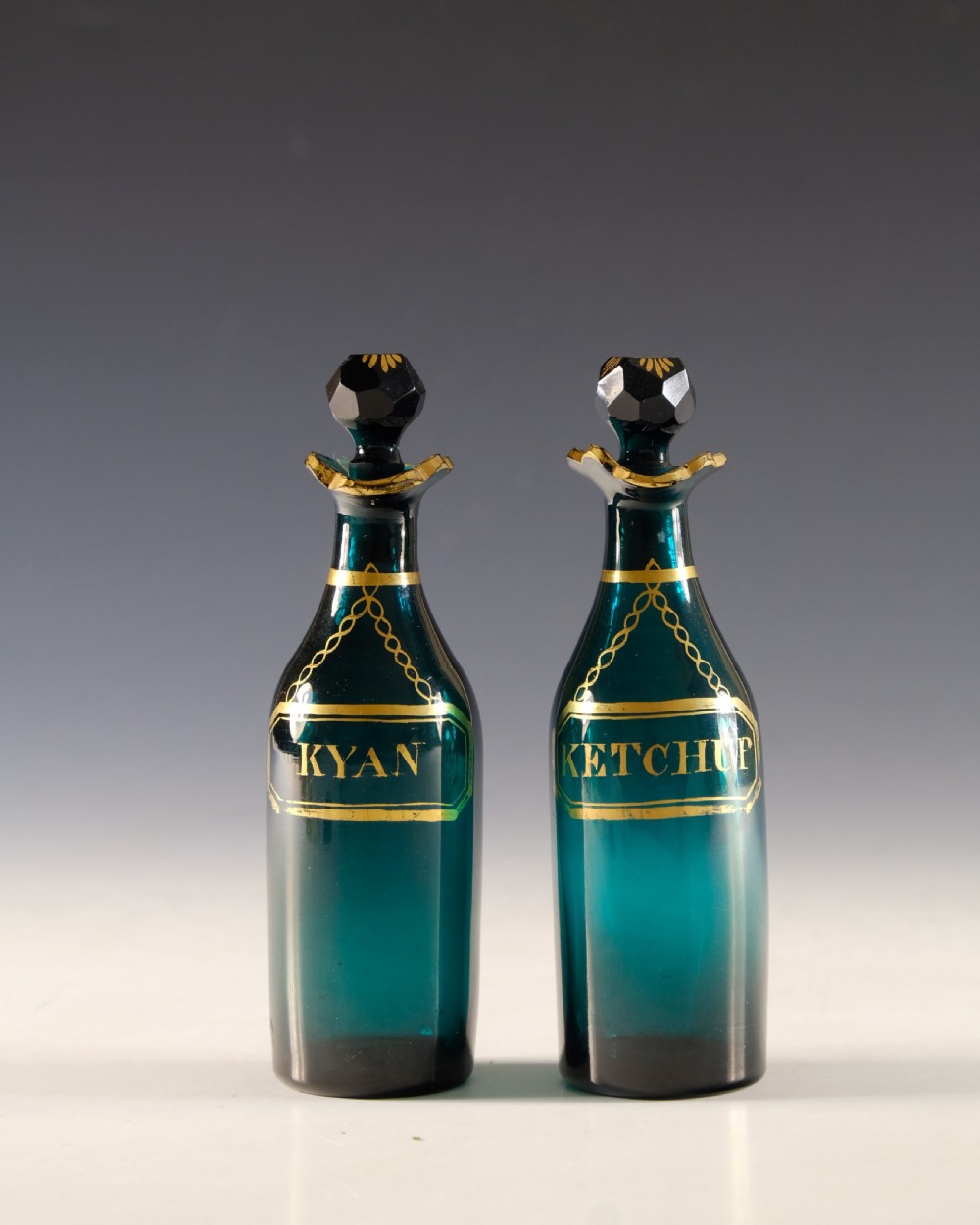 Antique glass - pair of green cruet bottles English c1800 View II