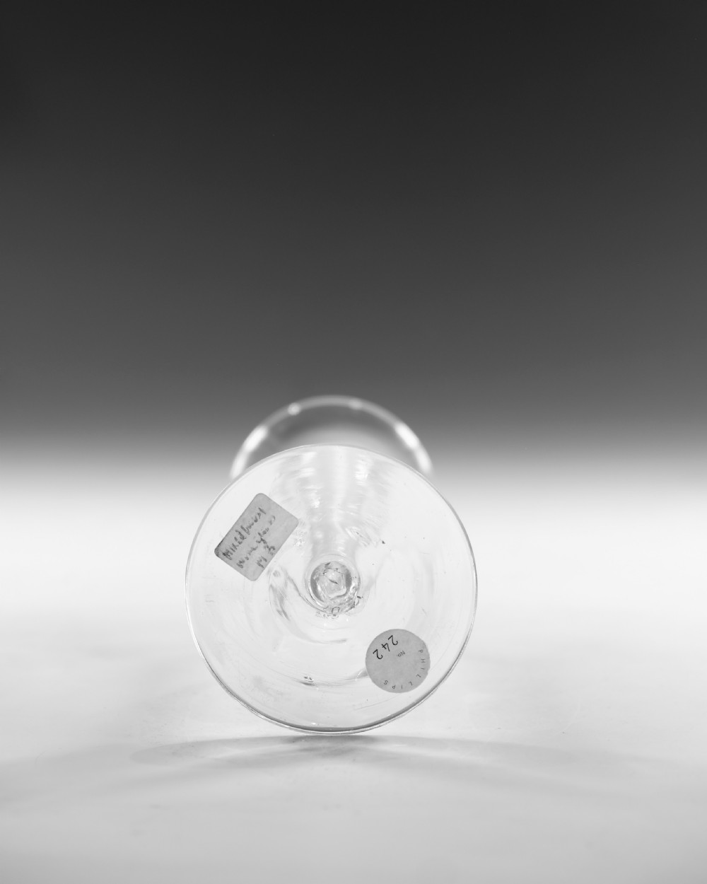 A clear Georgian lead crystal wine glass featuring a bell-shaped bowl, a mixed twist stem, and a circular conical foot. View VI