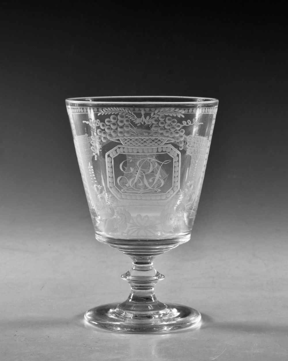 An antique clear glass rummer featuring detailed wheel engraving of a sailing ship beneath the Wearmouth Sunderland Bridge, supported by a knopped stem and circular foot. View IV