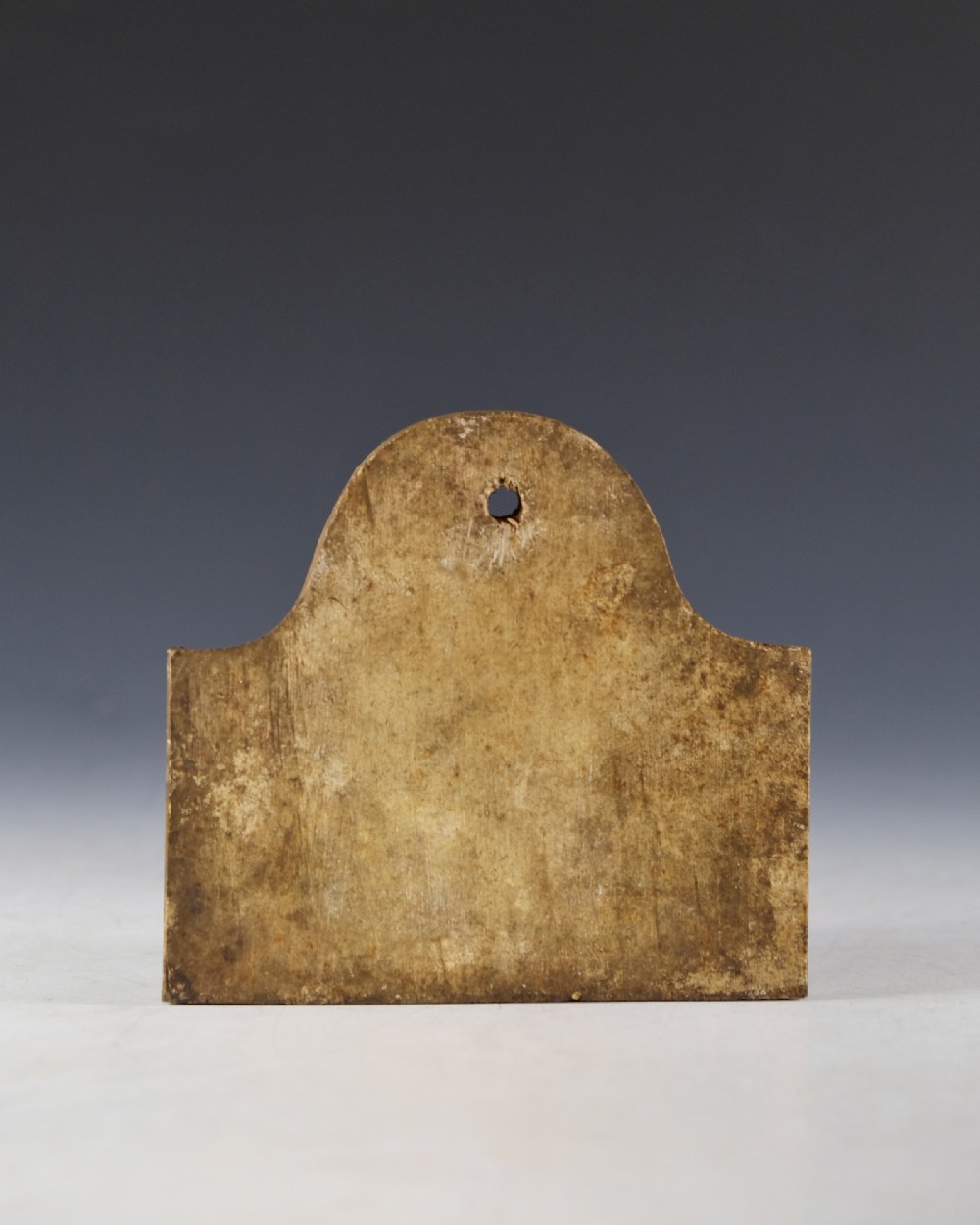 An arched Victorian creamware cellar bin label featuring handwritten dark ink text reading Marsala 1856 with a single hanging hole at the top. View III