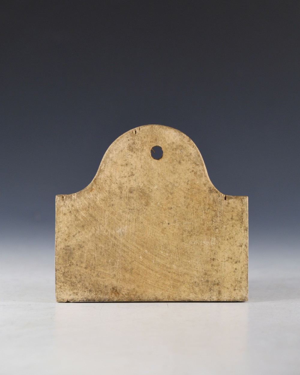 A mid 19th-century off-white creamware bin label with an arched top, suspension hole, and hand-written script reading Sherry Whites. View III