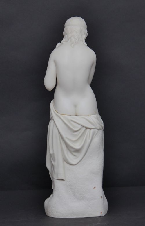 fig 1. 19th Century parian figure of a lady with a dove