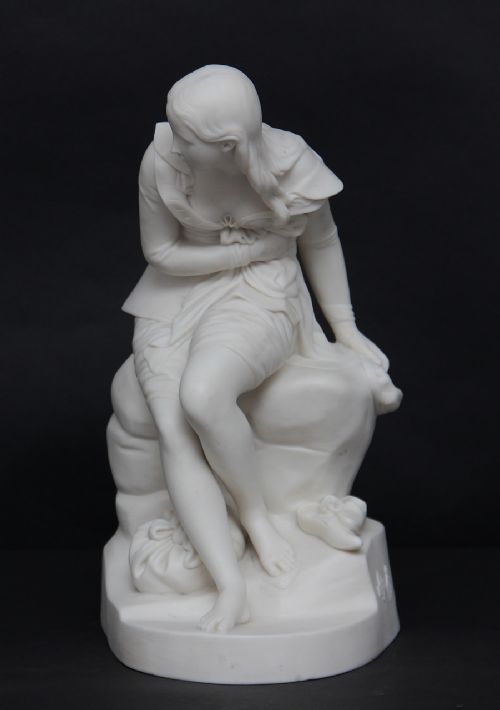 fig 1. 19th Century figure of a seated girl
