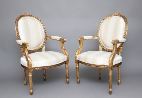 Pair of 19th Century Giltwood and Carved Armchairs