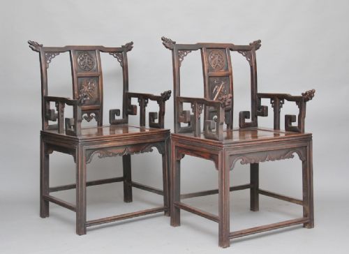 A Pair of Mid 19th Century Carved Chinese Armchairs