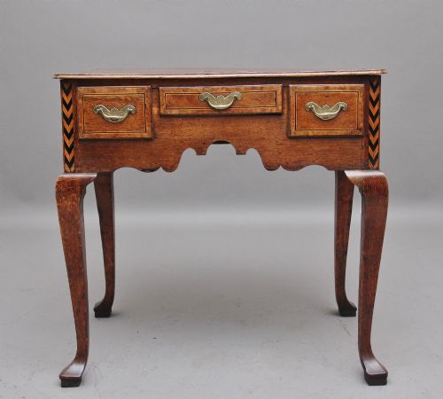 A DECORATIVE 18TH CENTURY OAK LOWBOY - ADDITIONAL PHOTO 3