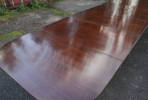 A LARGE EARLY 20TH CENTURY MAHOGANY FOUR PEDESTAL DINING TABLE - ADDITIONAL PHOTO 4