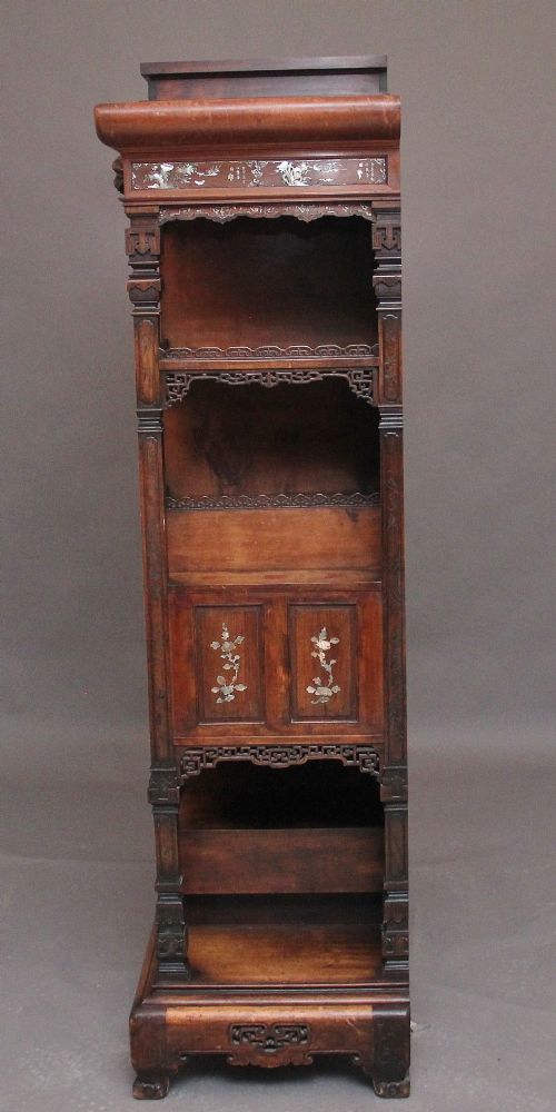 A dark brown 19th-century French Japonisme shodona display cabinet featuring mother-of-pearl inlays, asymmetrical shelves, and a carved pagoda crest with a dragon detail. View XI