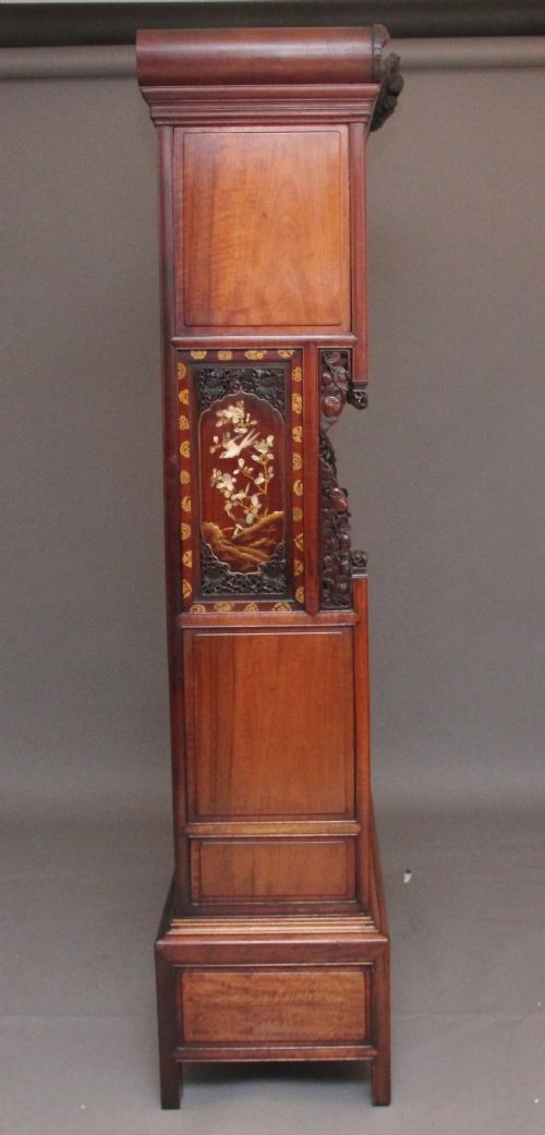 A large 19th-century Japanese Shodona display cabinet featuring multi-tiered asymmetrical shelves, carved dragon cresting, and mother-of-pearl inlaid doors depicting nature scenes. View V