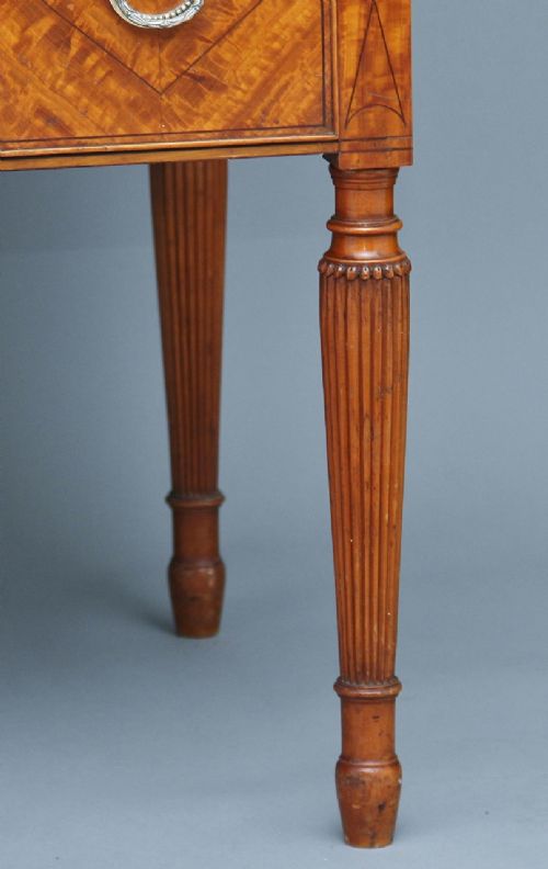 A 19th-century satinwood cylinder bureau bookcase featuring upper glazed doors, a roll-top writing section, lower drawers, and turned fluted legs. View XII