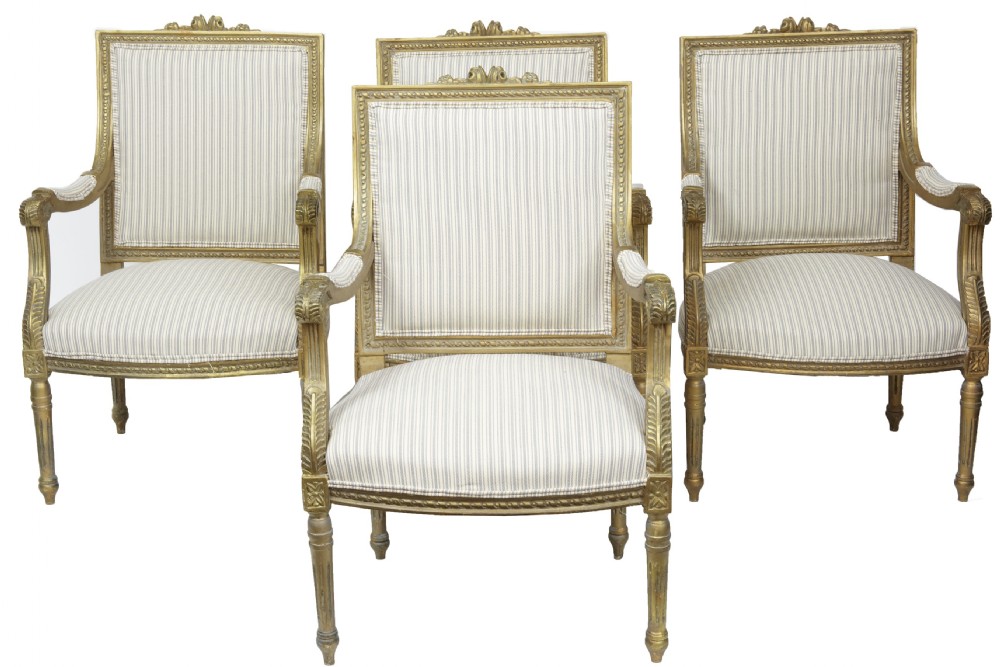 Set of four giltwood chairs