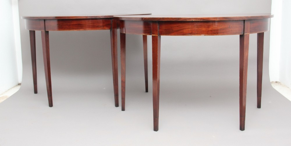 Pair demi-lune tables