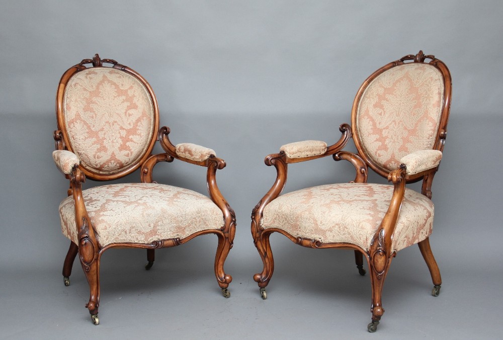 A pair of 19th Century walnut armchairs