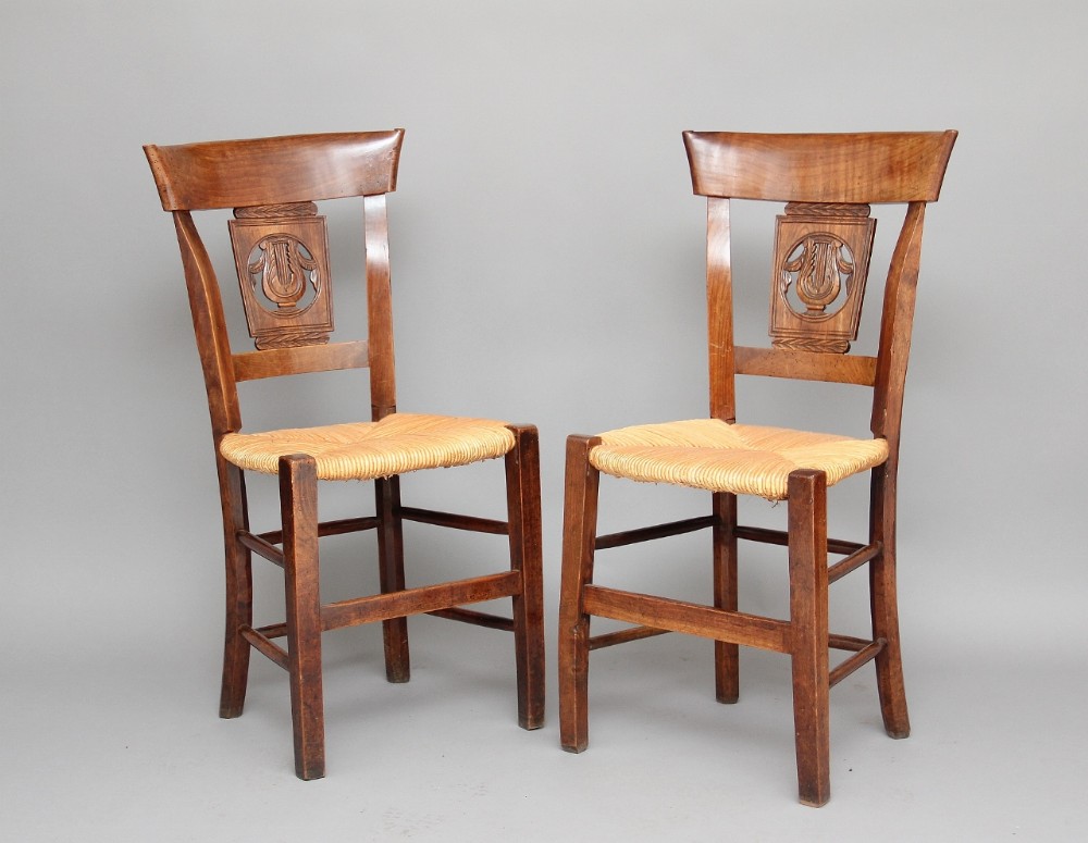 Pair 19th Century fruitwood chairs