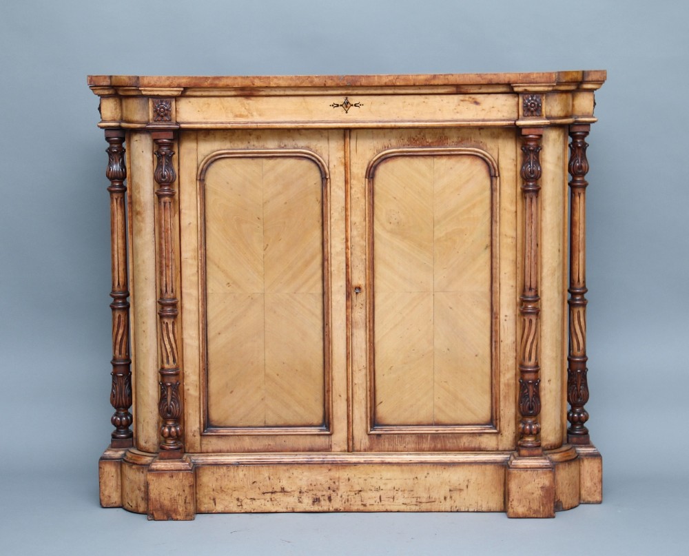 19th Century birds eye maple cabinet
