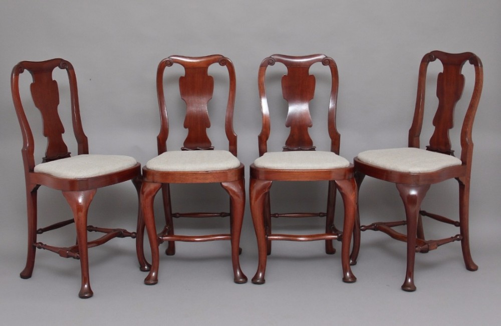 A set of four Queen Anne style counter stools