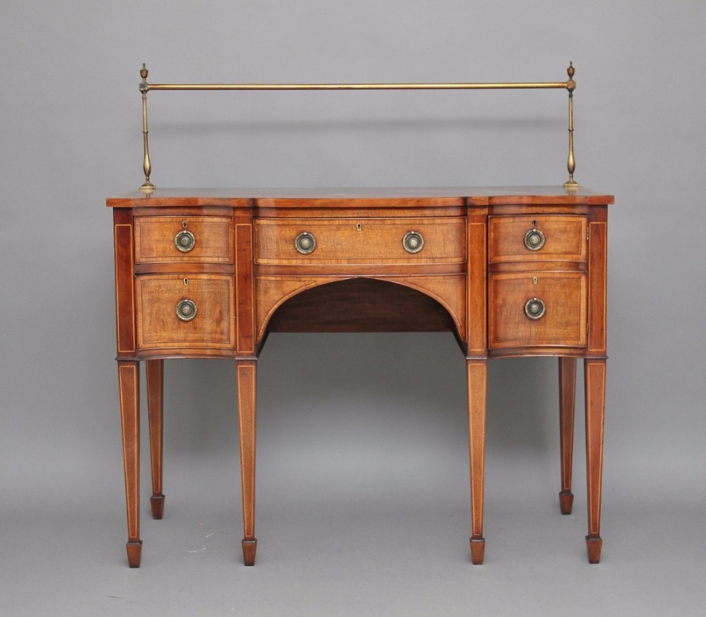 Early 20th Century mahogany serpentine sideboard