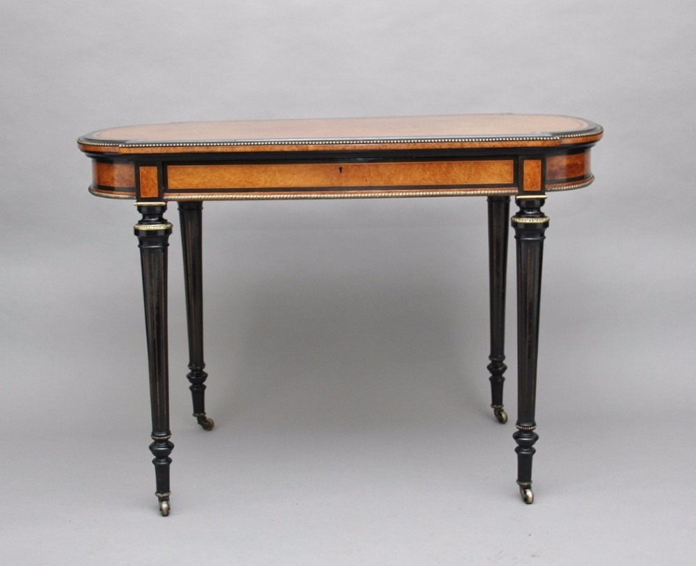 19th Century amboyna and ebonised centre table
