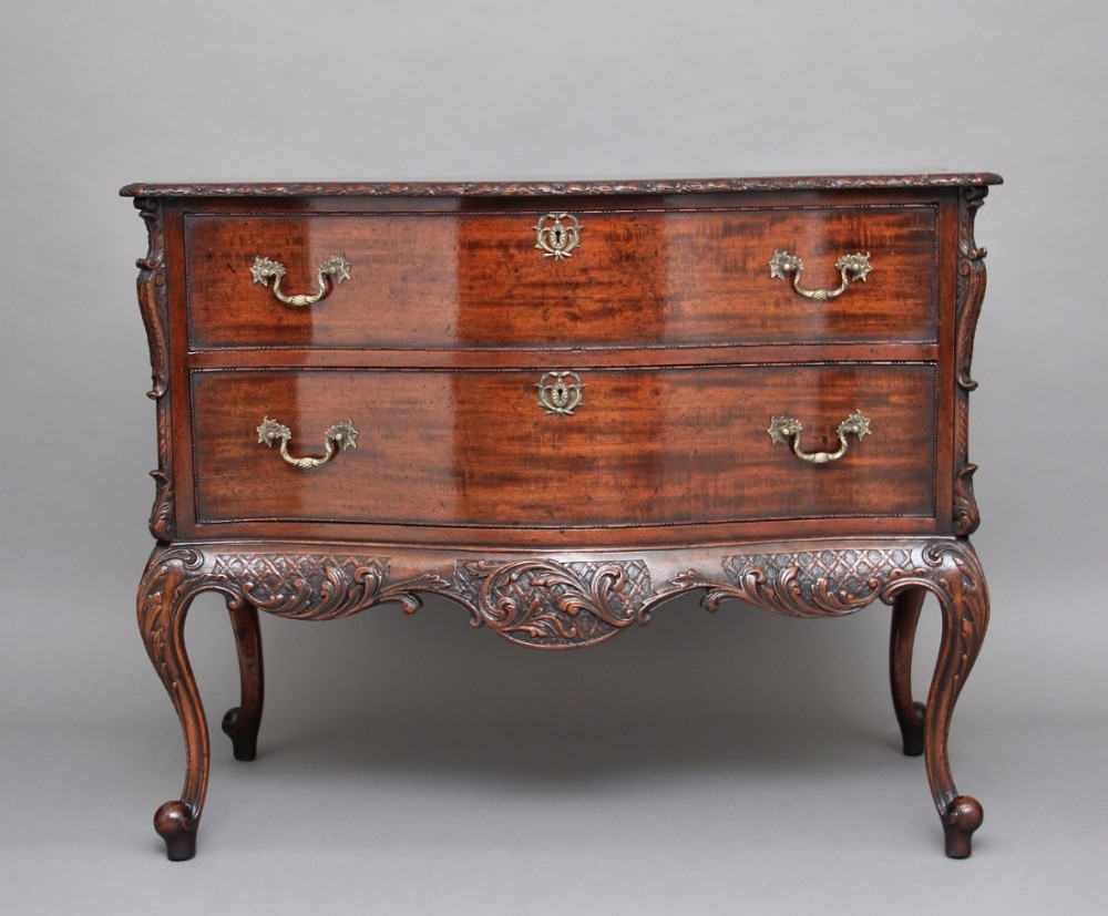 Early 20th Century mahogany serpentine commode