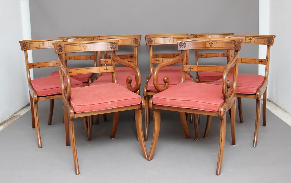 A set of 10 early 20th Century maple dining chairs