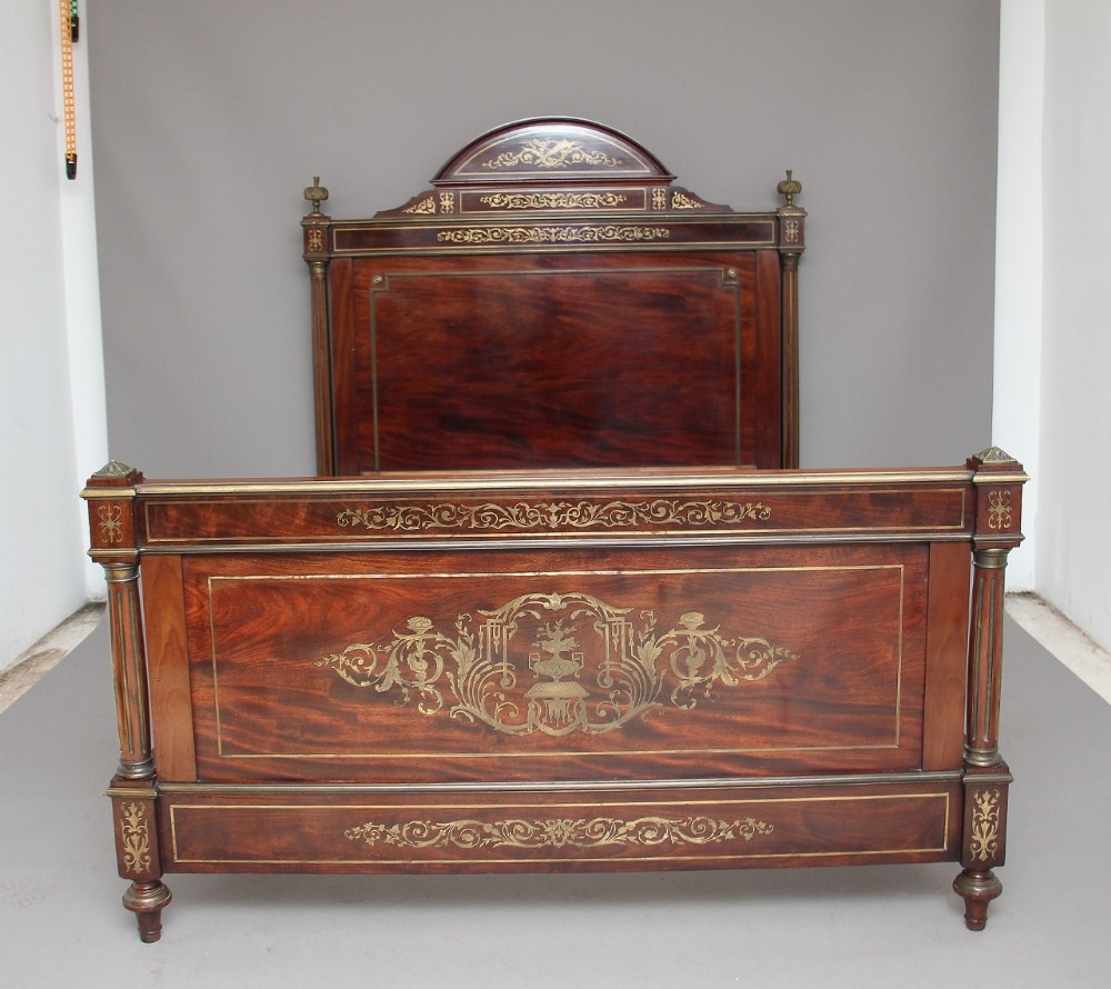 19th Century French mahogany and brass inlaid bed