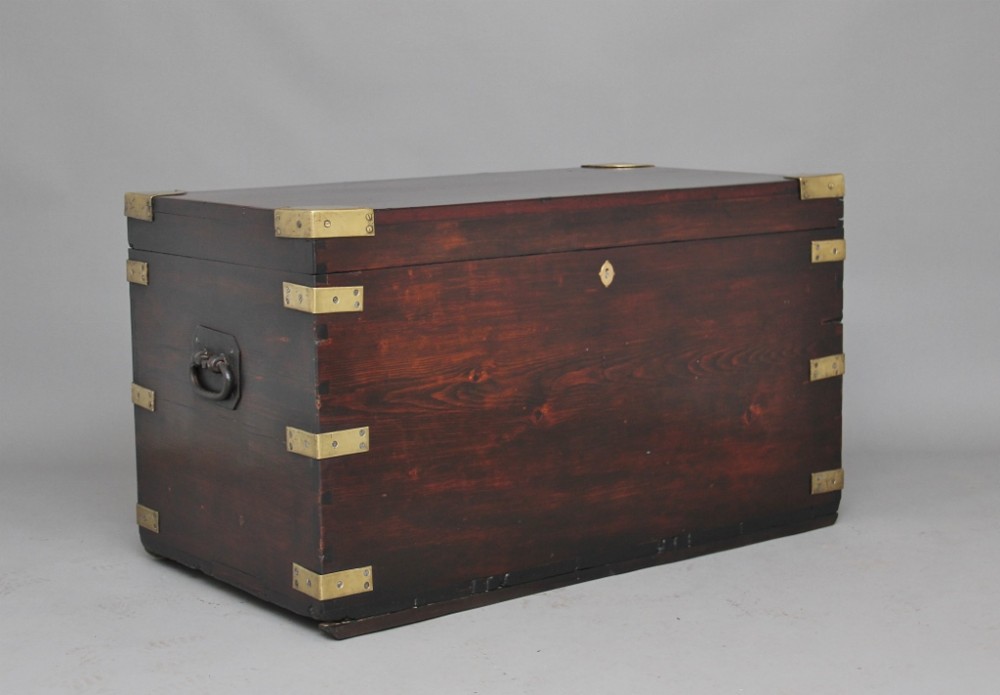 19th Century mahogany and brass bound trunk